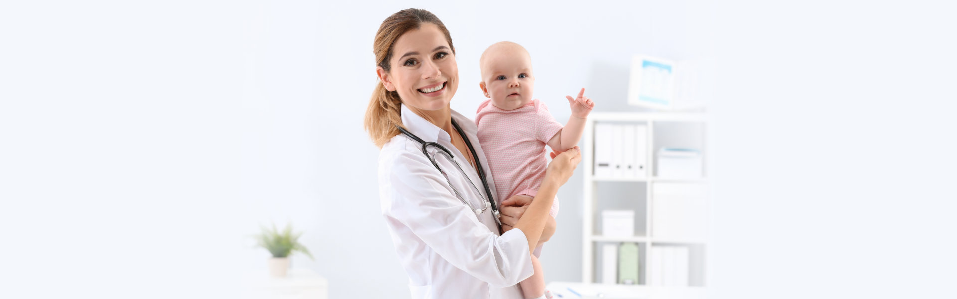 Children's doctor with cute baby